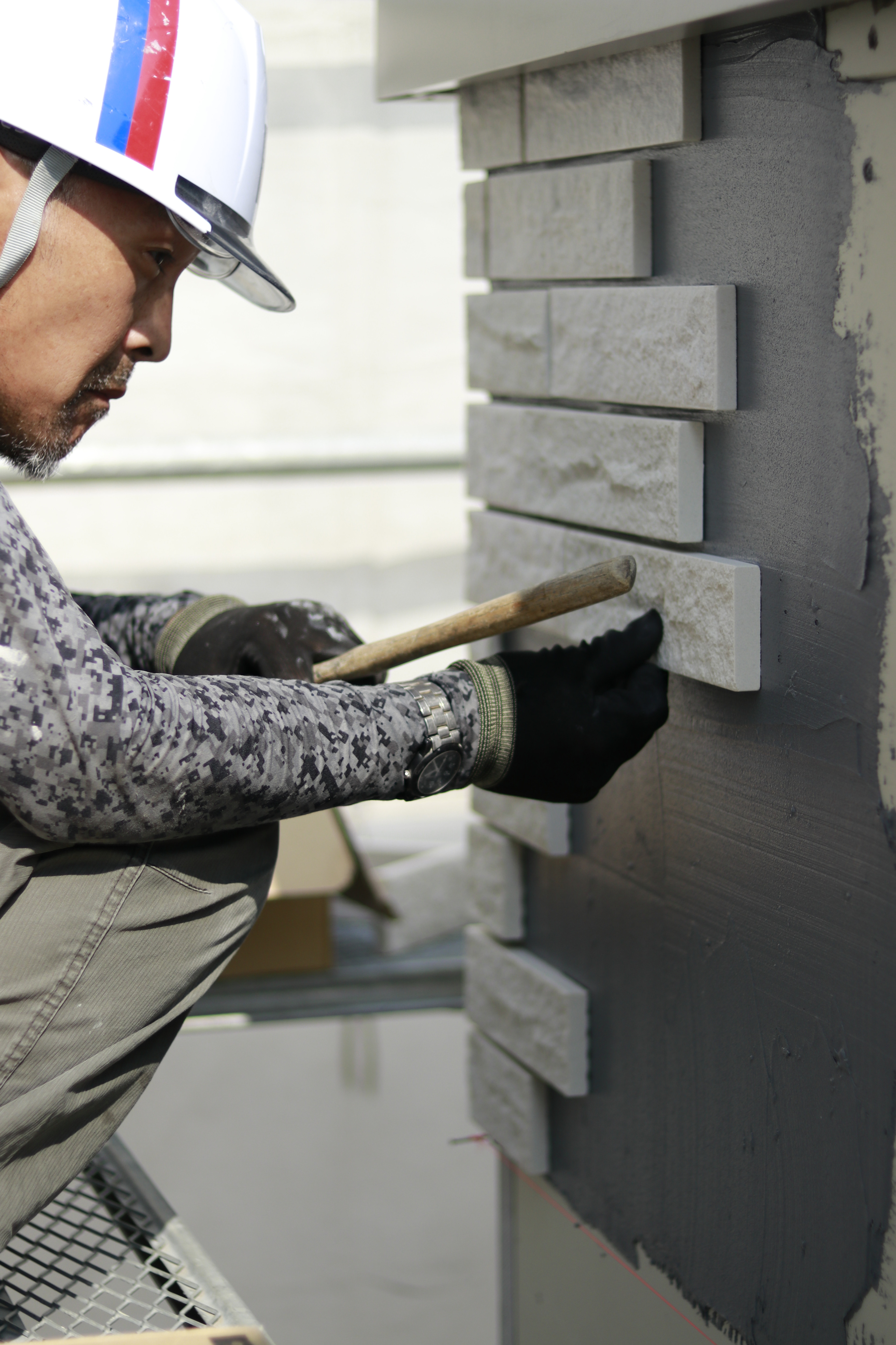 Worker building a house